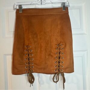 Rust Orange suede mini skirt with ties.